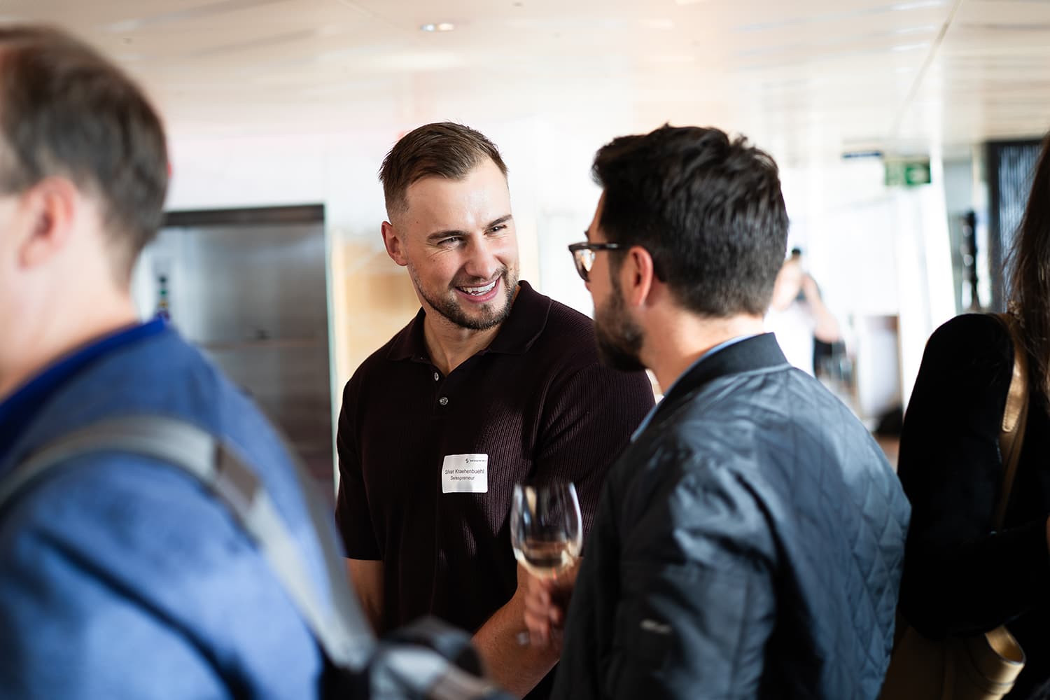 Silvan Krähenbühl of Swisspreneur talks with attendees on board the Scaleup Cruise